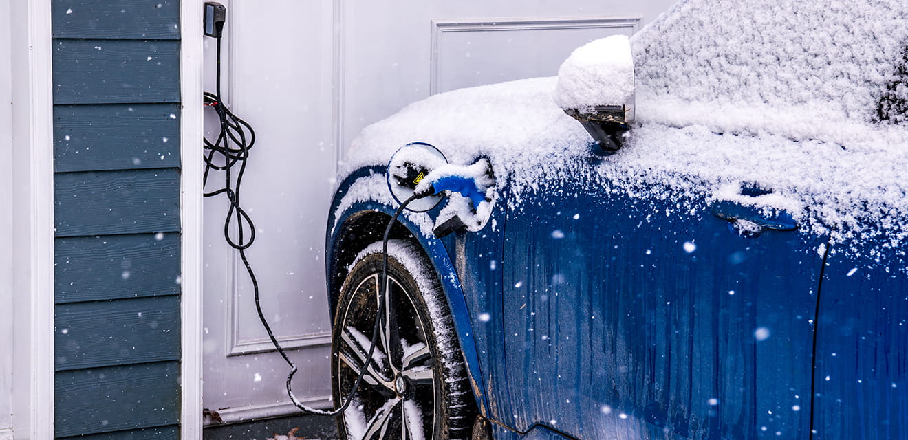Blue car charging from home