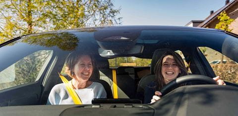 Two women driving Polestar 2 - 2022 NL
